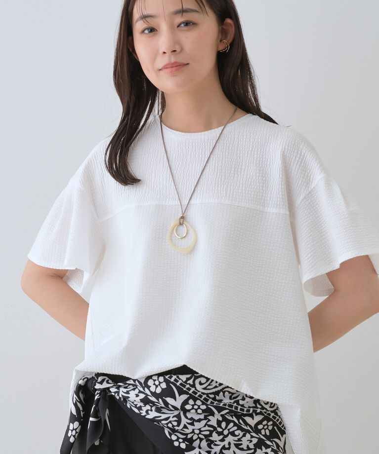 INDIVI「【洗える／体型カバー】凹凸素材フレアデザイントップス」|Tシャツ・カットソー|