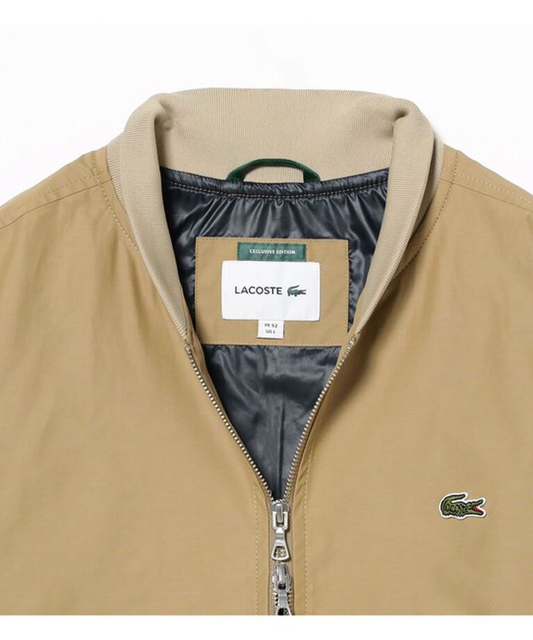 BEAMS「【別注】LACOSTE / スタジアムジャンパー」|ブルゾン・スタジャン|