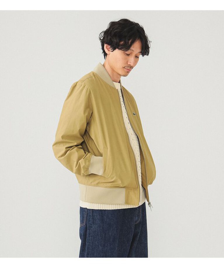 BEAMS「【別注】LACOSTE / スタジアムジャンパー」|ブルゾン・スタジャン|