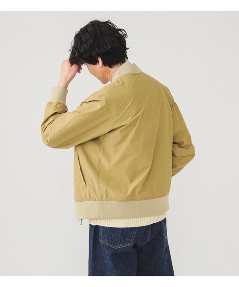 BEAMS「【別注】LACOSTE / スタジアムジャンパー」|ブルゾン・スタジャン|