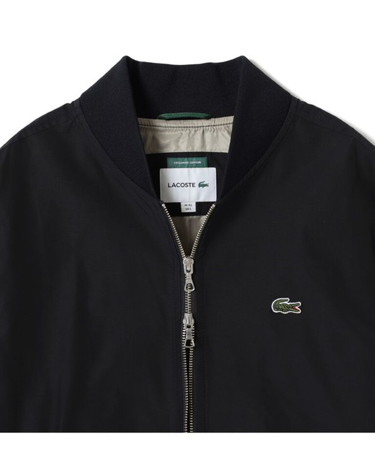 BEAMS「【別注】LACOSTE / スタジアムジャンパー」|ブルゾン・スタジャン|